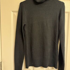 Woman’s Black Turtleneck Sweater